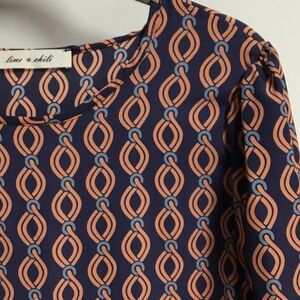 Lime n Chili brand Geometric Print Blouse in Navy and Orange new without tags. M